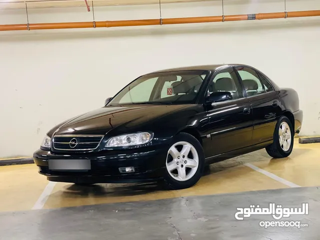اوبل اوميجا وارد الشركه دهان الشركه عداد 129 الف كيلو اصلي مخزنه