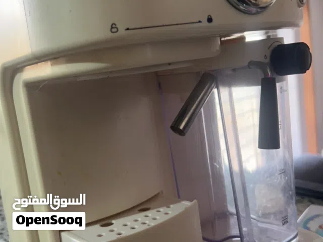 ماكينة قهوة وتسخين حليب