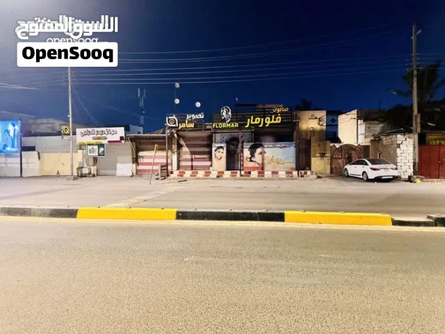موقع تجاري للبيع في عويسيان على الشارع العام