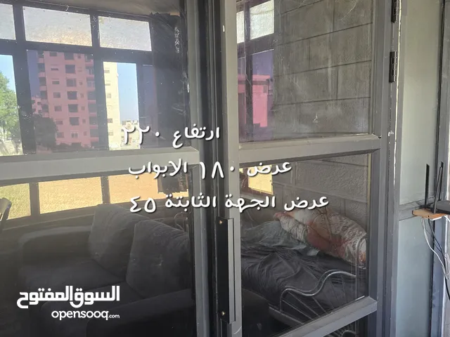 باب المنيوم دفتين