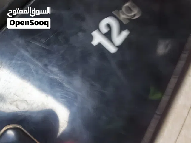 غسالة ماركة كاندي12 كيلو بحالة ممتاز مافيها اي مشاكل