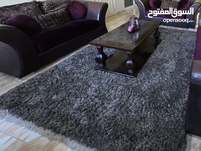 A Plush Grey Shaggy Rug for Sale