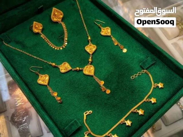 طقم مطلي ذهب