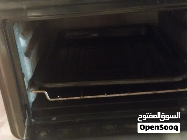 فرن كهربائي وقلاية هوائية ومكنسة روبوت