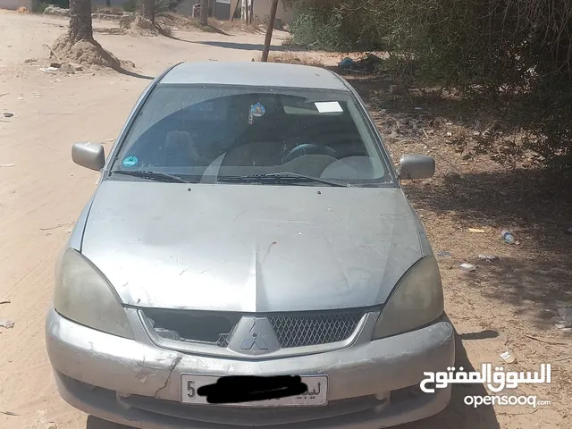 زوز متشايت لانسر. وحده تجري ربيى يباىك مكبف وكمبيوعادي والتانية رابش معاها محرك 20 وكمبيو تماتك