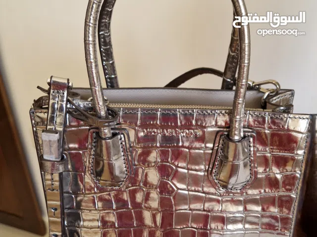 Like new Michael Kors crossbody bag metallic colour