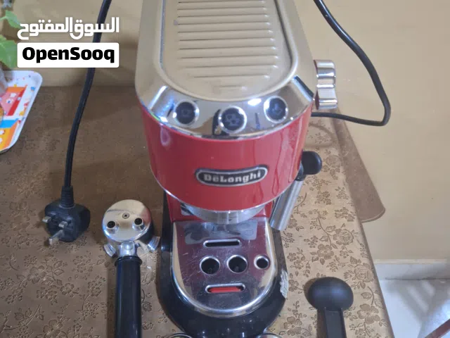 ماكينة قهوة ديلونجي ديديكا حمراء الأصلية مع كامل معداتها بحالة ممتازة جدا شغاله