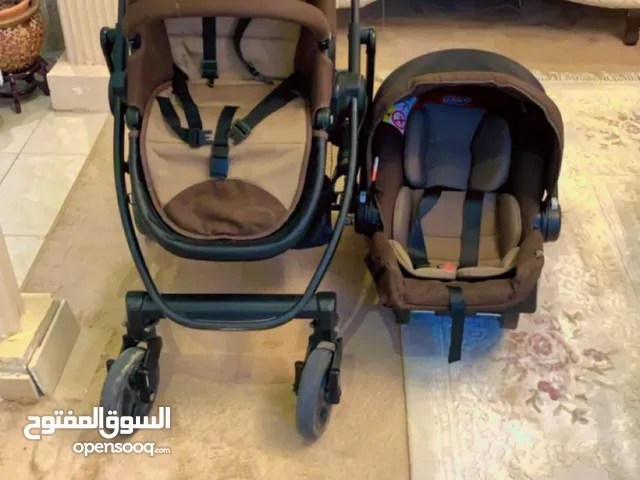 عربية اطفال مع كرسي سياره ماركة جراكو graco