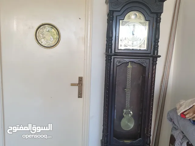 ساعه منزل ذهبي و بني للبيع
