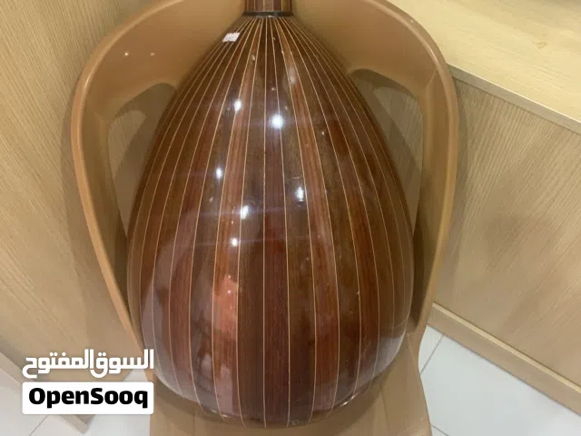 تعليم العزف على العود  تصليح  تركيب اوتار  محل مفتاح الصول مجمع السندس حولي