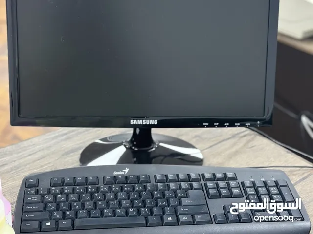 Computer with keyboard and mouse.