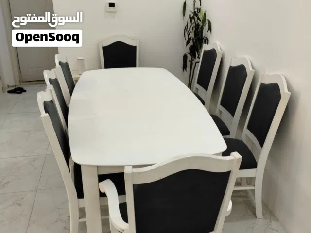 طاولت طعام 8كراسي على السوم