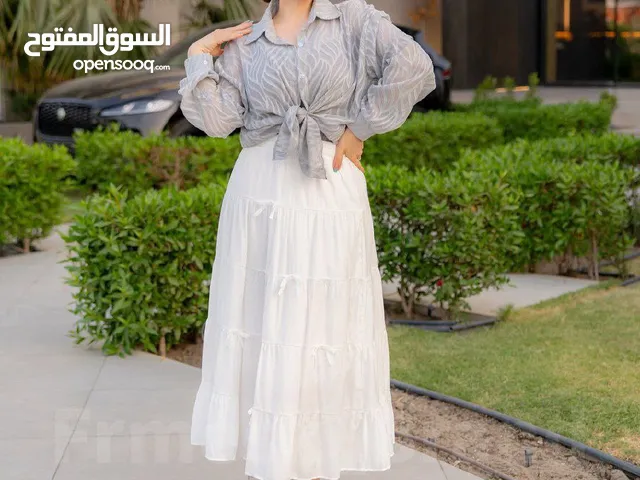 تنورة فيونكة كتان فاخرة – أناقة ناعمة وإطلالة راقية لكل الأوقات متوفر لون ابيض واسود