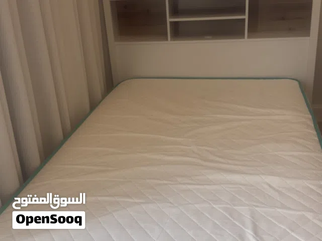 New bed frame with a mattress