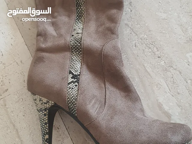 Black With Heels in Amman