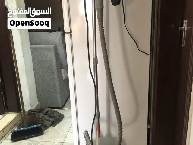مكوة ملابس افقية