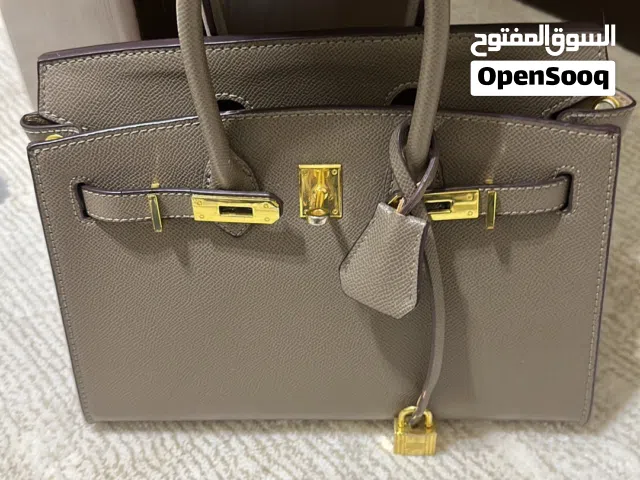 شنطة هرمز بنية حلوه