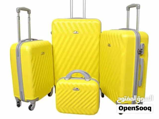 شنط سفر للبيع أصفر