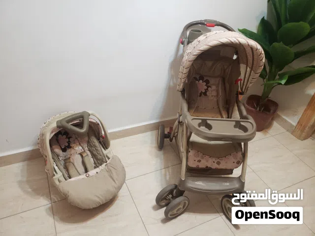 عرباية اطفال وكرسي اطفال ماركه بحالة الجديد