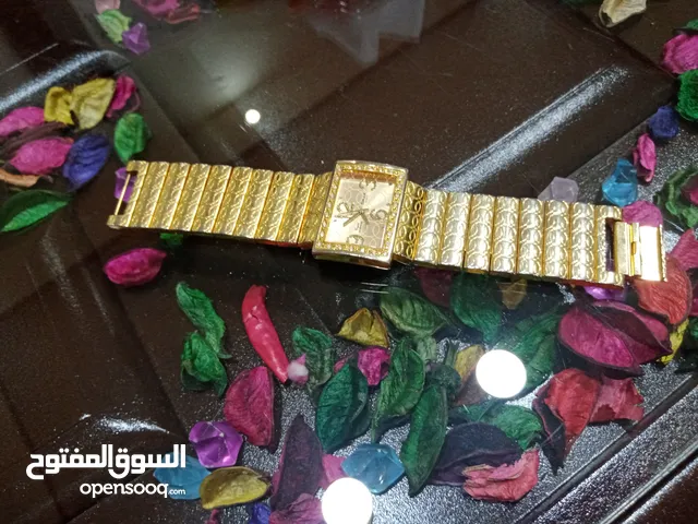 ساعه اوماكس اصليه جديدة مذهبي وعلى الاطار ستراس سلفر بسعر 10 دنانير