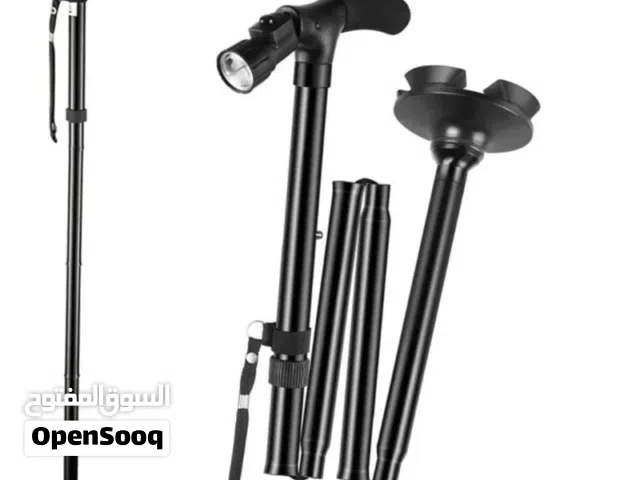 عصا عكاز الطبي 4 في1 MAGIC CANE لون اسود قابل للطي مع ضوء مانع انزلاق تحكم بالطول عكاز باكور عكازه ط