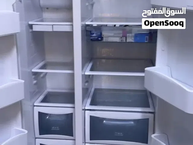 ثلاجة مع فريزر عمودي