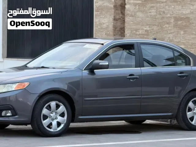 كيا اوبتما موديل 2009 ماشيه 100 زواق بركوربي امامي فقط خاليه من العيوب