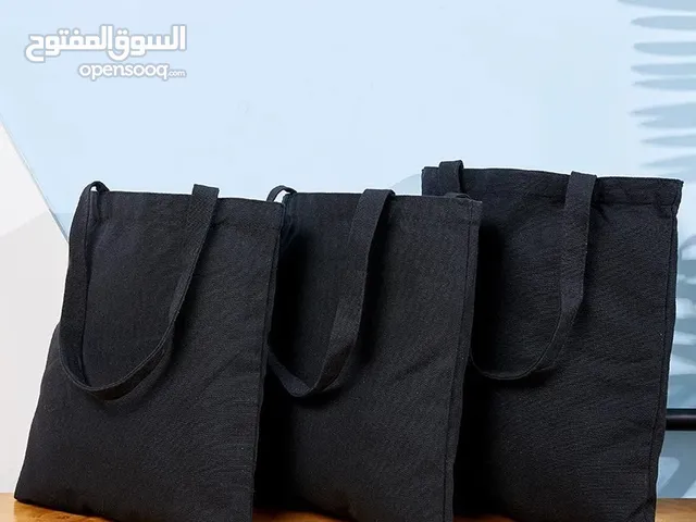 حقائب  قماشية متوفره بلونين بيج و أسود 
