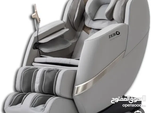 كرسي مساج كهربائي تحت الضمان لونه رمادي