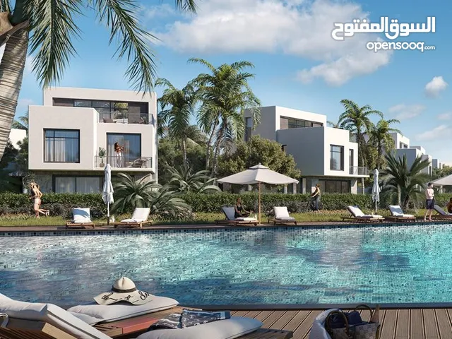 شاليه للبيع متشطب بالتكييفات فى قرية سيزن الساحل الشمالى seazen north coast