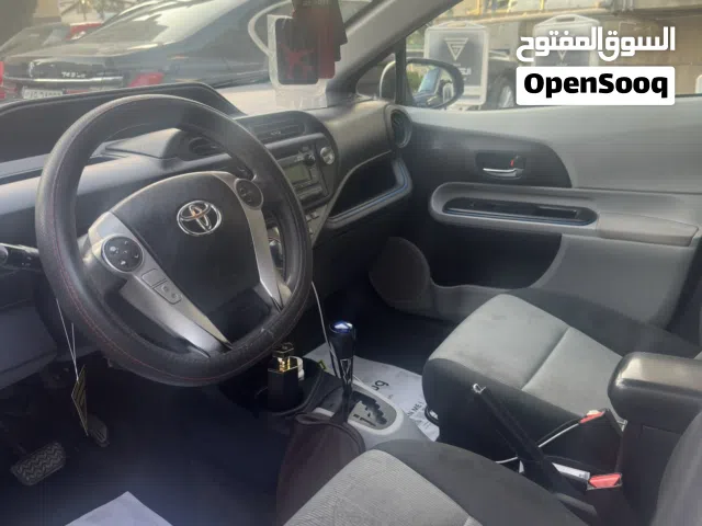 2013 تويوتا بريوس Prius C