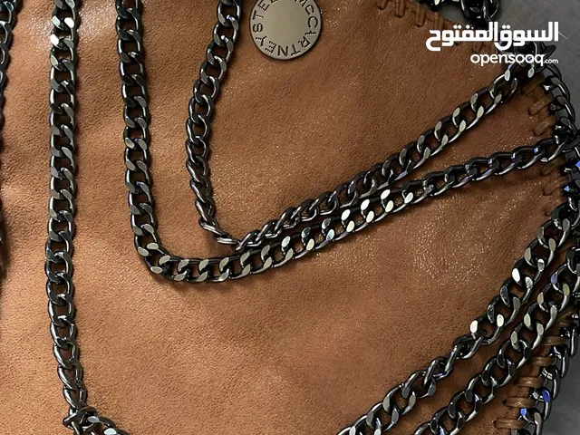 Stylish brown bag with dark silver details