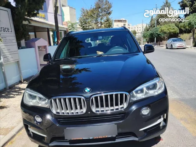 BMW x5 2017 pling in haibred وارد الشركه الاردنيه ابو خضر ممشى قليل لون اسود ملوكي