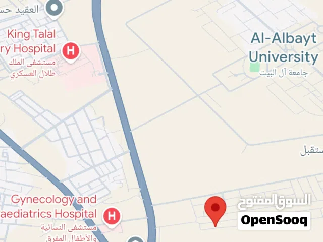 ارض مفروزة للبيع البوابة الجنوبية جامعة ال البيت بجانب كمباوند فلل