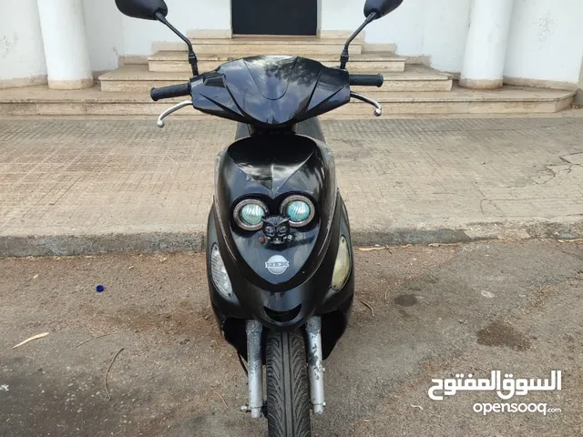 دراجة نارية اقتصادية ،سكوتر