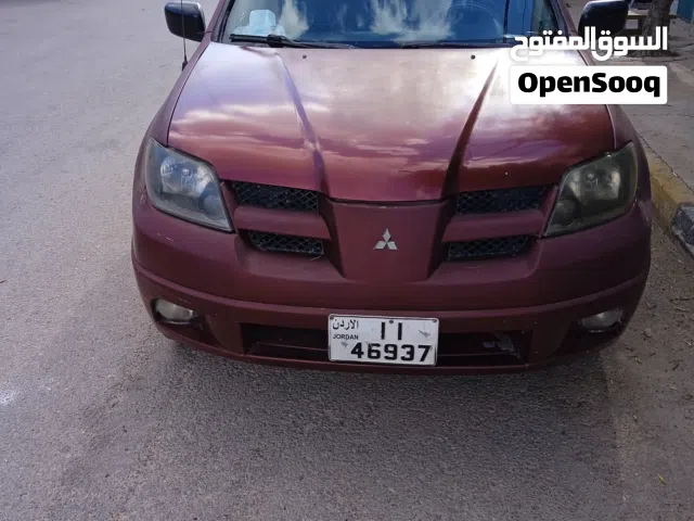 2003 ميتسوبيشي اوتلاندر GLS