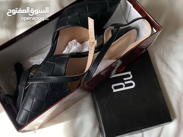 Black With Heels in Buraimi
