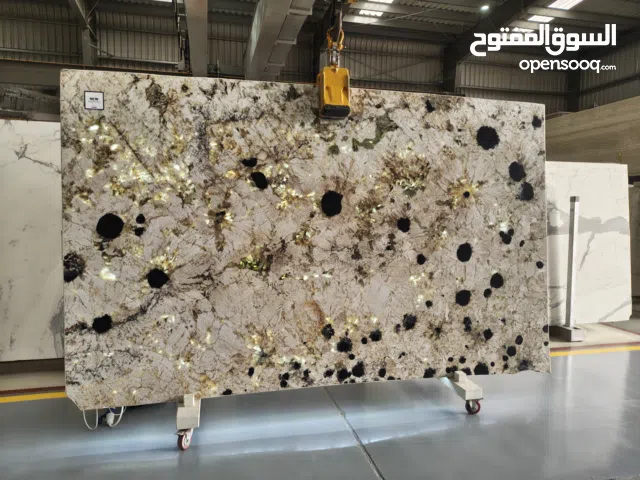 NATURAL STONE, QUARTZITE AND GRANITE