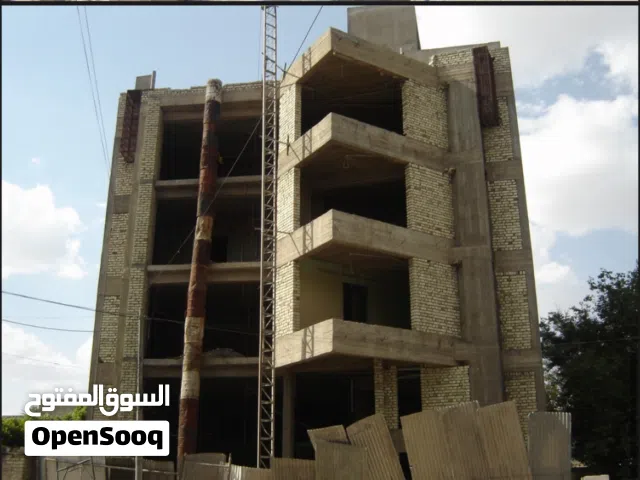 عمارة سكنية - تجارية 5 طوابق CD-RM واجهة 15 متر كرادة داخل قرب ابو نؤاس