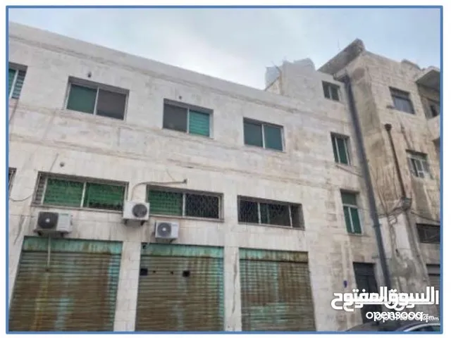 مجمع تجاري في منطقة العبدلي بالقرب من البنك المركزي