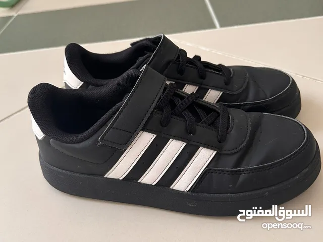 Black adidas sneakers