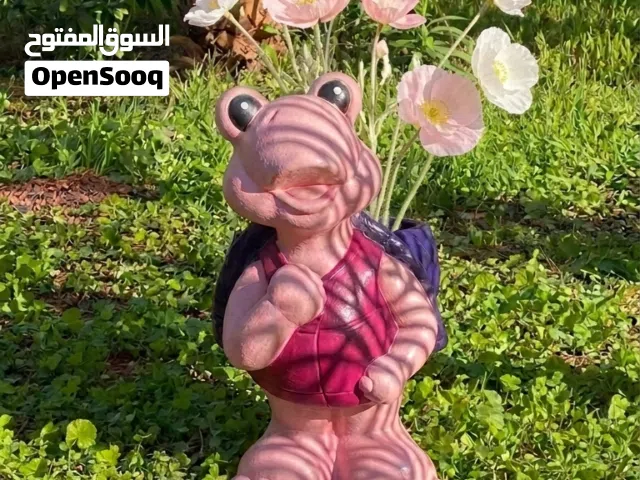 سلحفاة مع ستاند حامل للورد لتزيين حدائقكم