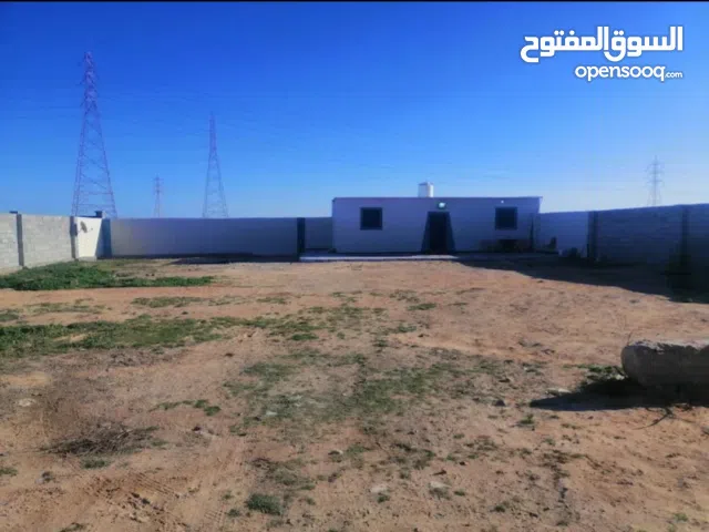 قطعة أرض 1000 متر  مسيجه بها غرفتين للايجار