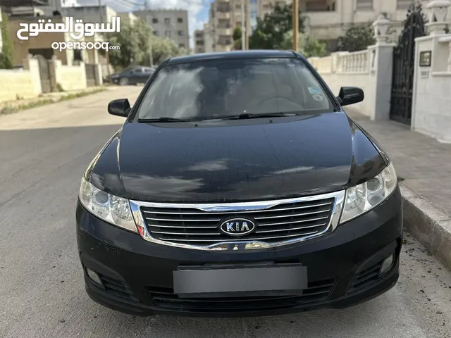كيا اوبتيما وارد وكالة كيا توب نظافة لون اسود فتحة فحص كامل 2009 السيارة استعمال شخصي