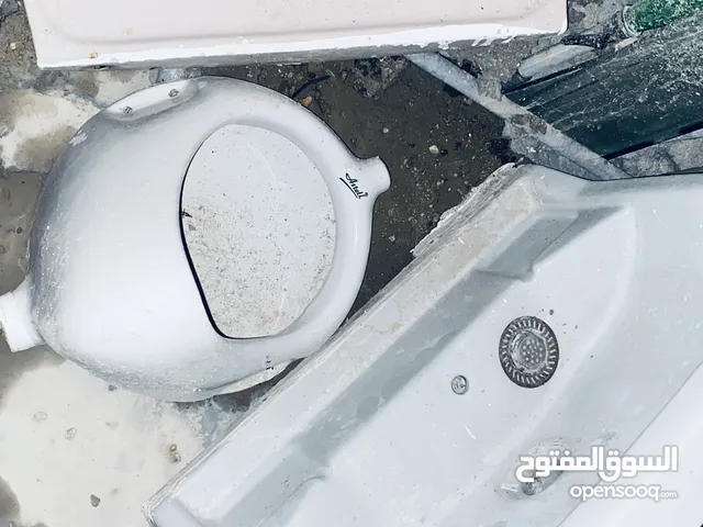 مغسلة ومبولة ورف رخام