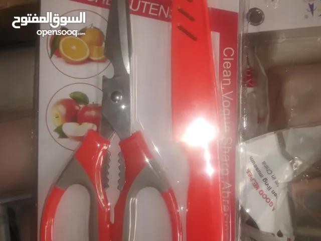 سكين و مقص بتلات ألوان