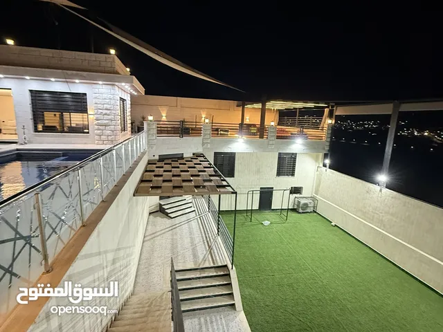 شالية فندقي للايجار اليومي مع مسبح داخلي مدفئ و مسبح خارجي