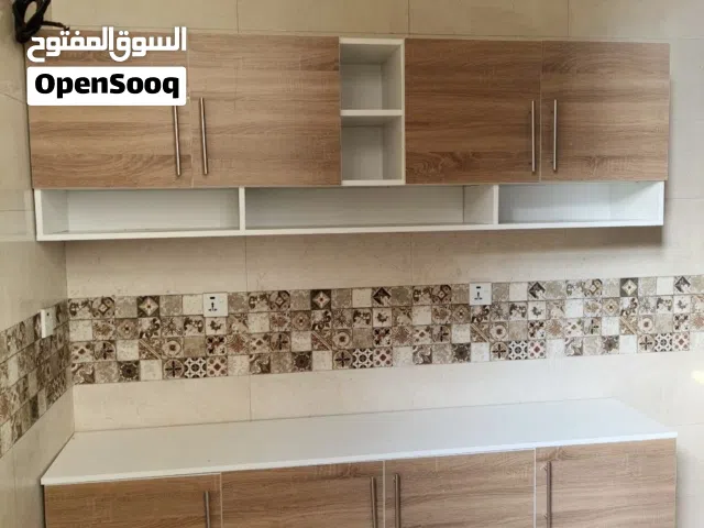 كاونتر خشب مترين ارضي وملحق متر و 20 سنك مرمر