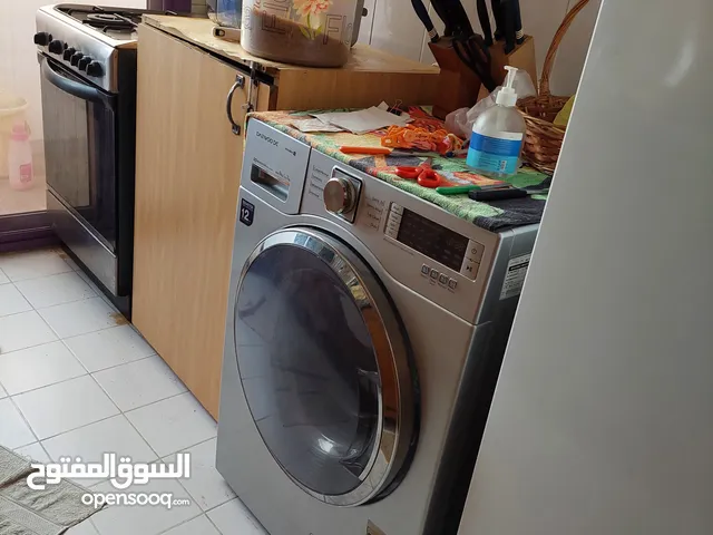 Daewoo washing machine Wash 9Kg/Dry 7Kg in Abudhabi Khaldiya