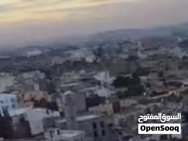 أرض سكنية 634 م2 قريبة من الخمسة شوارع وتبعد تقريبآ 50م عالرئيسي 2400د للمتر.